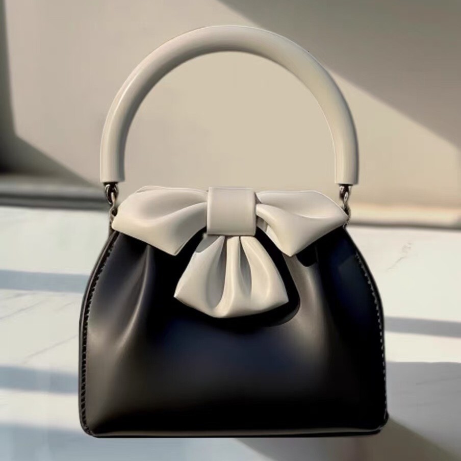 Top brand high-quality new free designer 2025 new French color block bow pleated handbag black handbag new free designer handbag