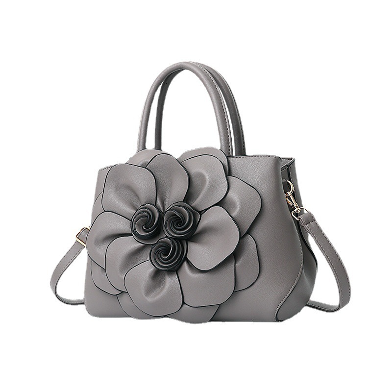 Luxury Brand Designer Bag 2024 Spring Solid Color New Academy Style Women's PU Leather Flower Handheld Shoulder Cute Bag