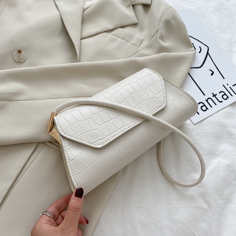 New popular women's bag trend fashionable women's single shoulder underarm French commuter bag retro designer solid color single shoulder un