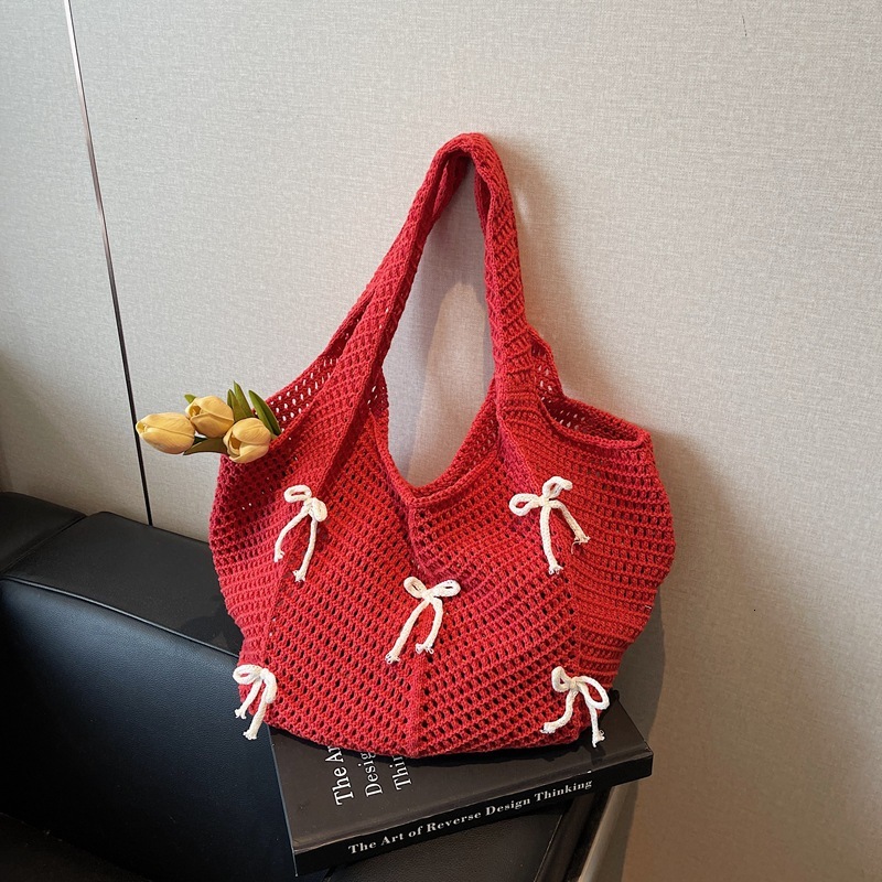 2025 New Summer Fashion Knitted Designer Women's Hollow Handbag New Fashion Knitted Bow Beach Shoulder Bag Trend