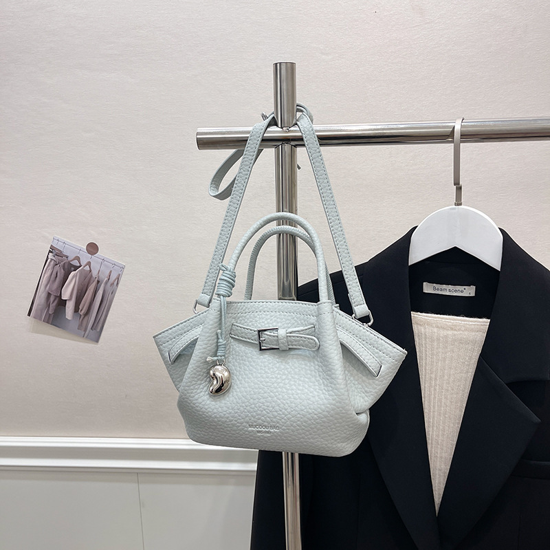 2025 New Summer Fashion Pulling Rope Dumplings Handheld Single Cross Shoulder Designer Women's Bag Trendy Shoulder Bag
