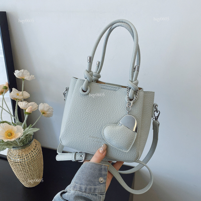 Top quality Brand High Quality New Style Free Delivery Designer Bag 2025 Women's Small Exquisite High-end Texture Heart Shoulder Simple Light Lux