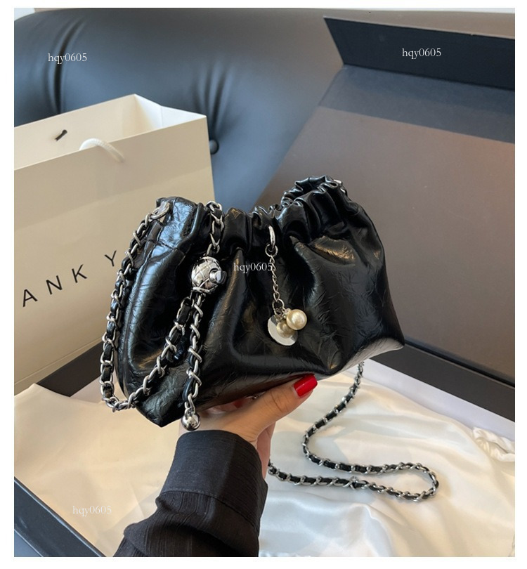 Top quality Brand High Quality New Style Free Delivery Designer Bag Summer High-End Niche Versatile Crossbody Chain for Women 2024 Silver Drawstring B