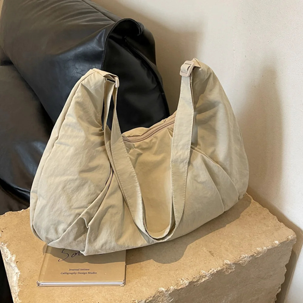 Lightweight pleated dumpling bag womens casual crossbody largecapacity versatile solidcolor singleshoulder ADH 250528