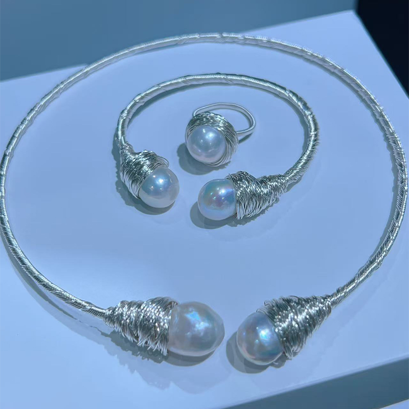 Chic Minimalist Pearl Accessory Pairing Featuring a Soft Choker Neckpiece Alongside a Coordinating Wrist Ornament