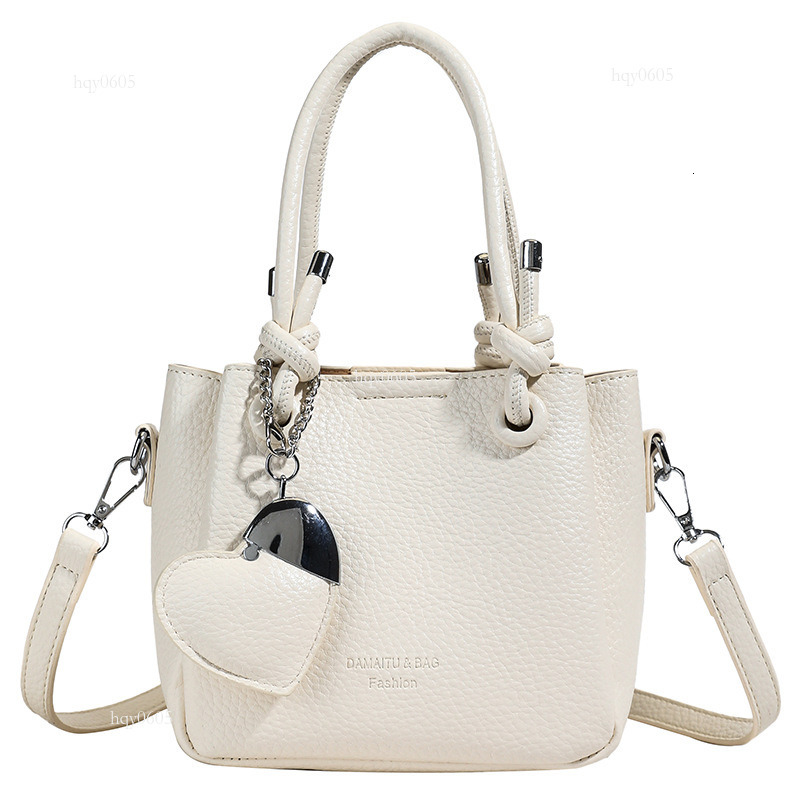 Top quality Brand High Quality New Style Free Delivery Designer Bag 2025 Women's Small Exquisite High-end Texture Heart Shoulder Simple Light Lux