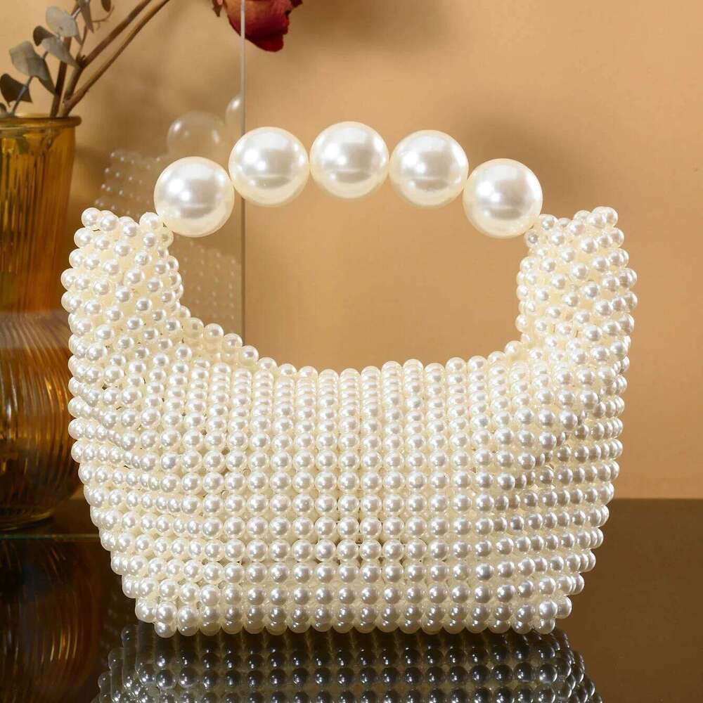 European and American style new beaded Summer women's pearl hand woven wrist bag Fashion temperament handbag