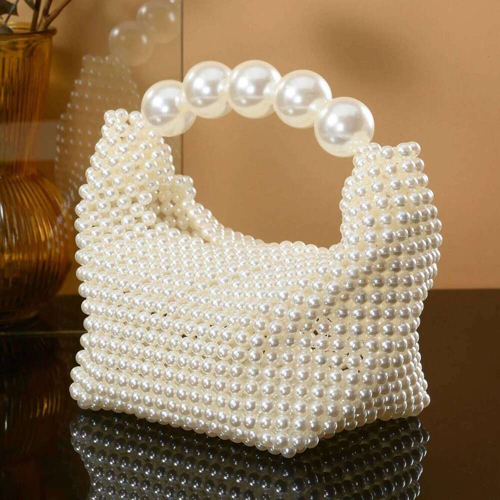 European and American style new beaded Summer women's pearl hand woven wrist bag Fashion temperament handbag