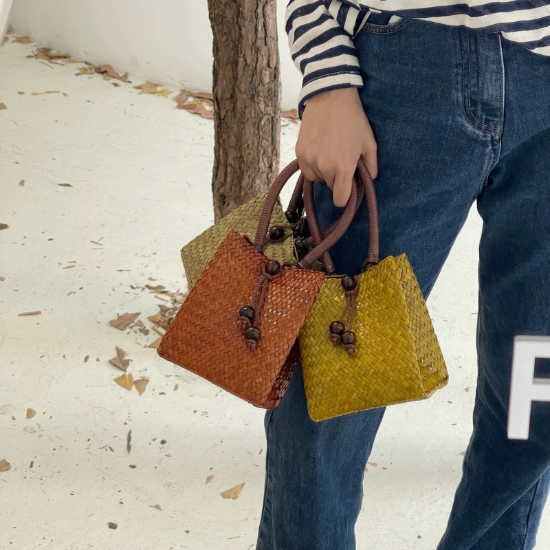 Free Shipping Designer Bag Thailand Imported Vintage Straw Woven Small Tote Bag With Wooden Buckle Solid Color Woven Bag Bucket Bag For Women