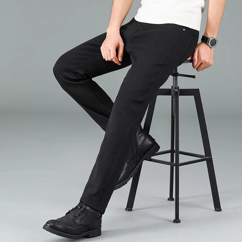 Mens pure black jeans Korean version trendy straight fit pants mens comfortable and elastic classic business jeans 250526