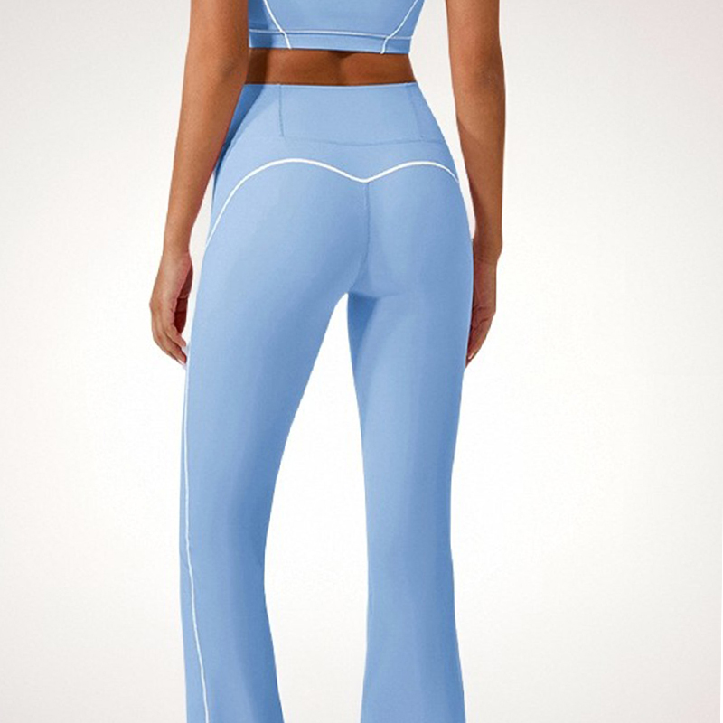 High-Waist Womens Yoga Pant: Stretchy Fabric with Flared Hem and Side Slits for Comfort during Exercise