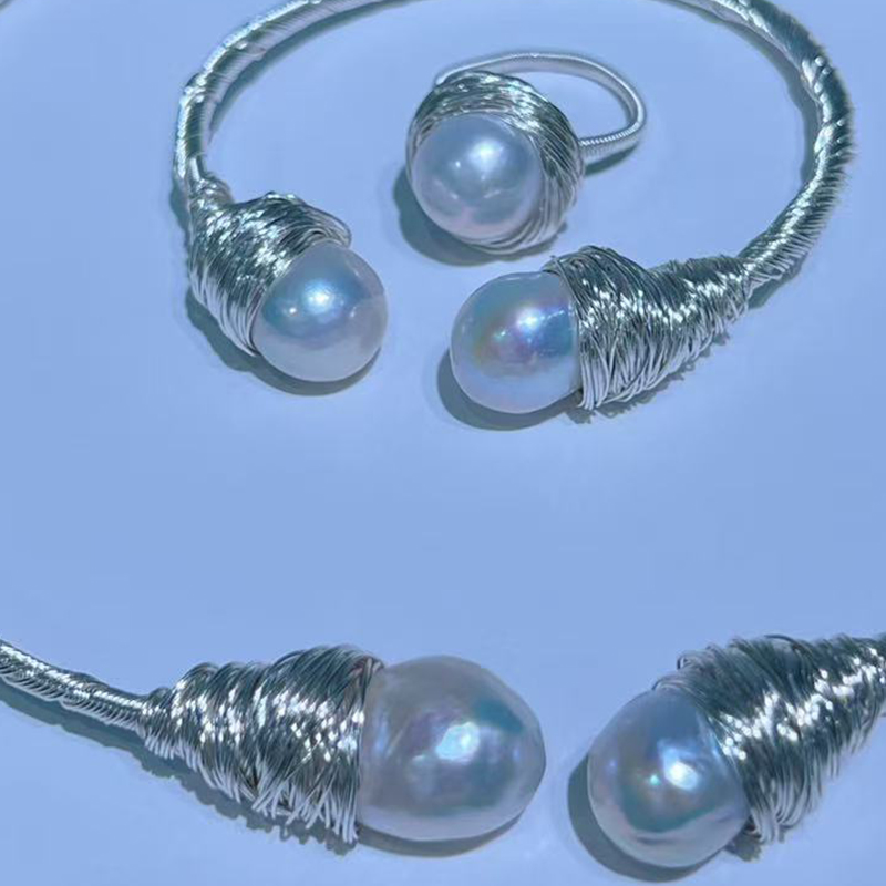 Chic Minimalist Pearl Accessory Pairing Featuring a Soft Choker Neckpiece Alongside a Coordinating Wrist Ornament