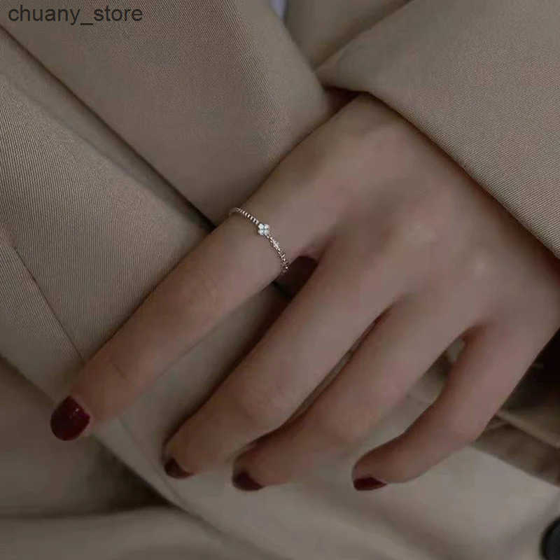 ANENJERY Silver Color Zircon Flower Twist Thin Ring For Women Asymmetric Exquisite Simple Jewelry All Match z250529NIC6