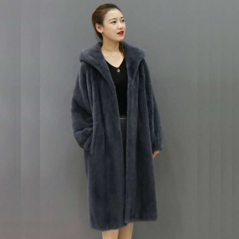 The new faux mink fur for autumn and winter is casual trench coat with a long, knee-length hoodie in veet jacket