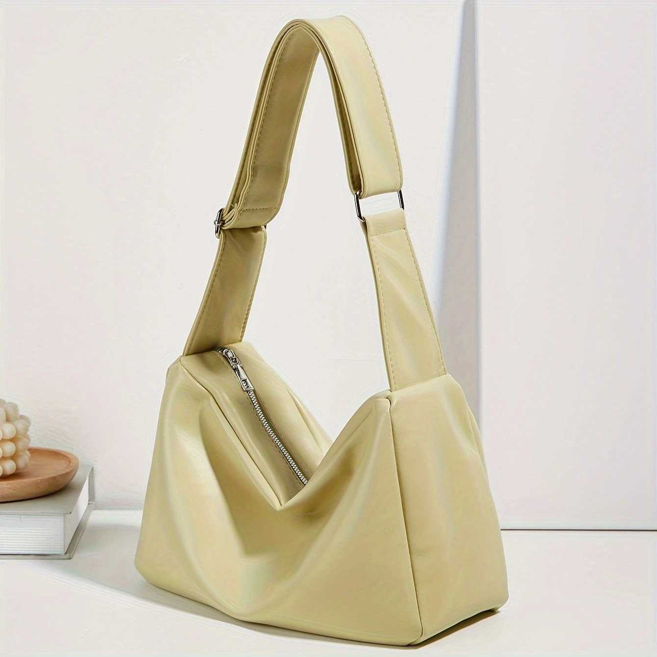 Soft leather niche minimalist work commuting tote bag for college students to carry to class as a shoulder bag or crossbody bag. XJ2520528