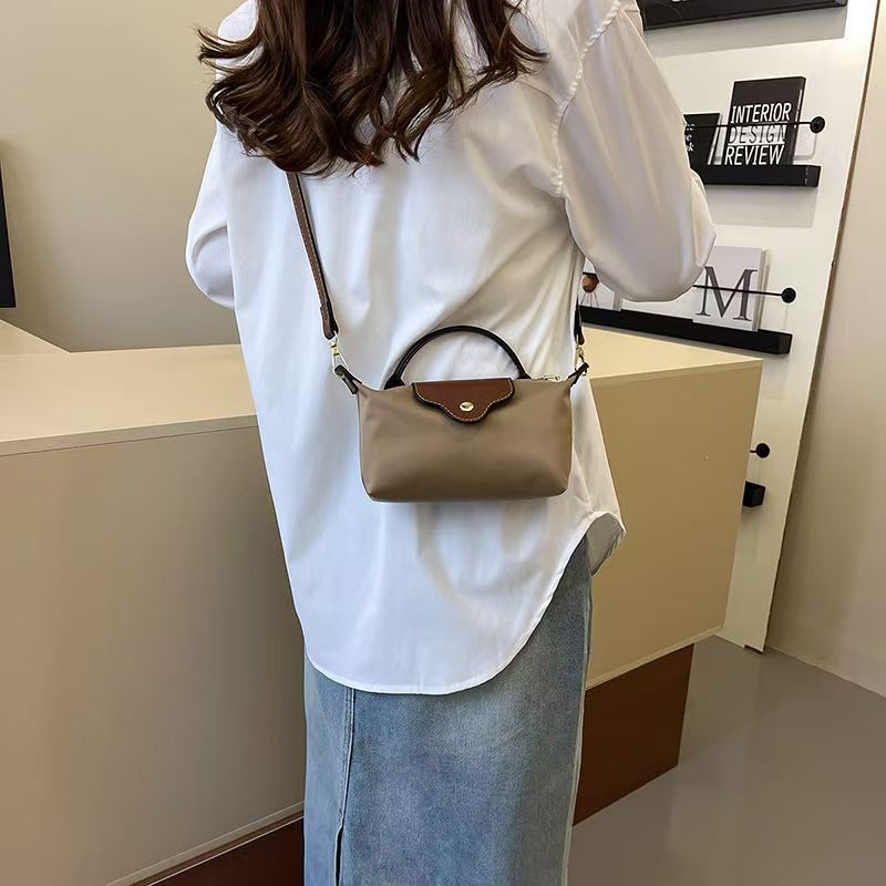 Free shipping mini bag charm single shoulder crossbody bag beach bag texture hand bag bag armpit new mahjong bag designer bag 2025