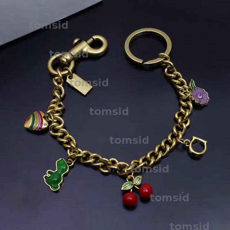 Elegant Womens Initial Keychain Stylish Letter Charm Long Chain Bag cessory Versatile Car Key Buckle Jewelry Keyring L250928KOFV