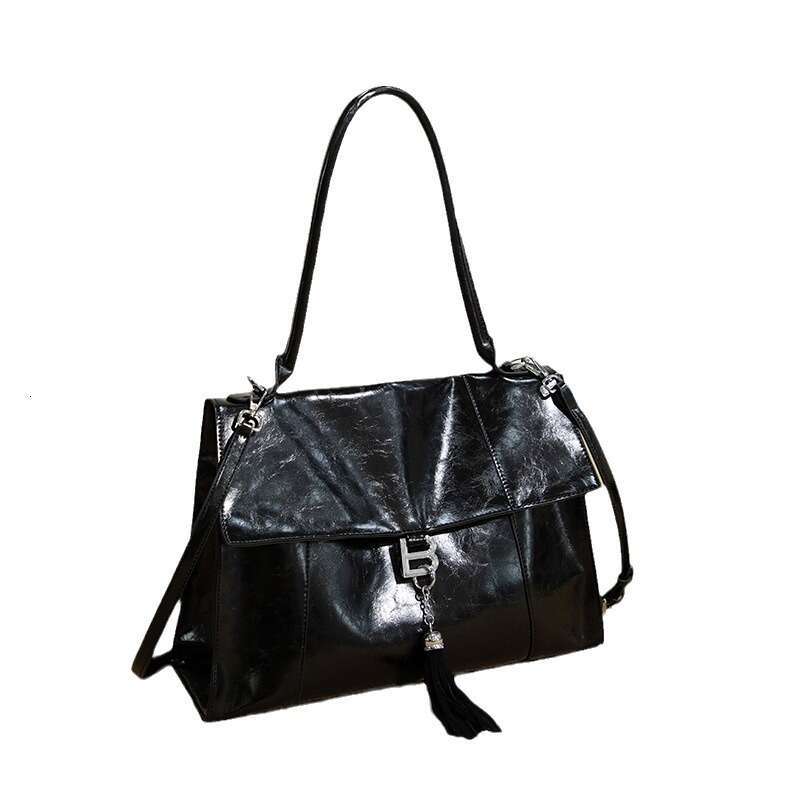 2025 New Single Shoulder Women's Cowboy Handbag Fashion Simple Commuter High end Large Capacity Women's Bag