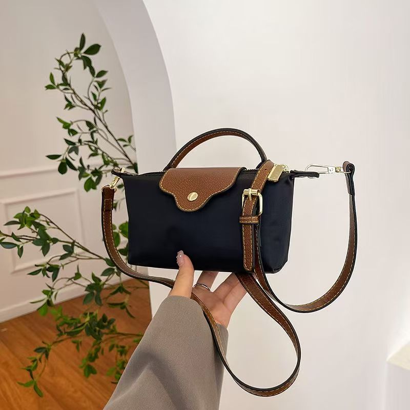 Free shipping mini bag charm single shoulder crossbody bag beach bag texture hand bag bag armpit new mahjong bag designer bag 2025
