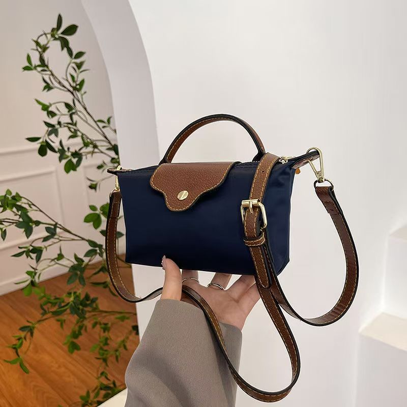 Free shipping mini bag charm single shoulder crossbody bag beach bag texture hand bag bag armpit new mahjong bag designer bag 2025