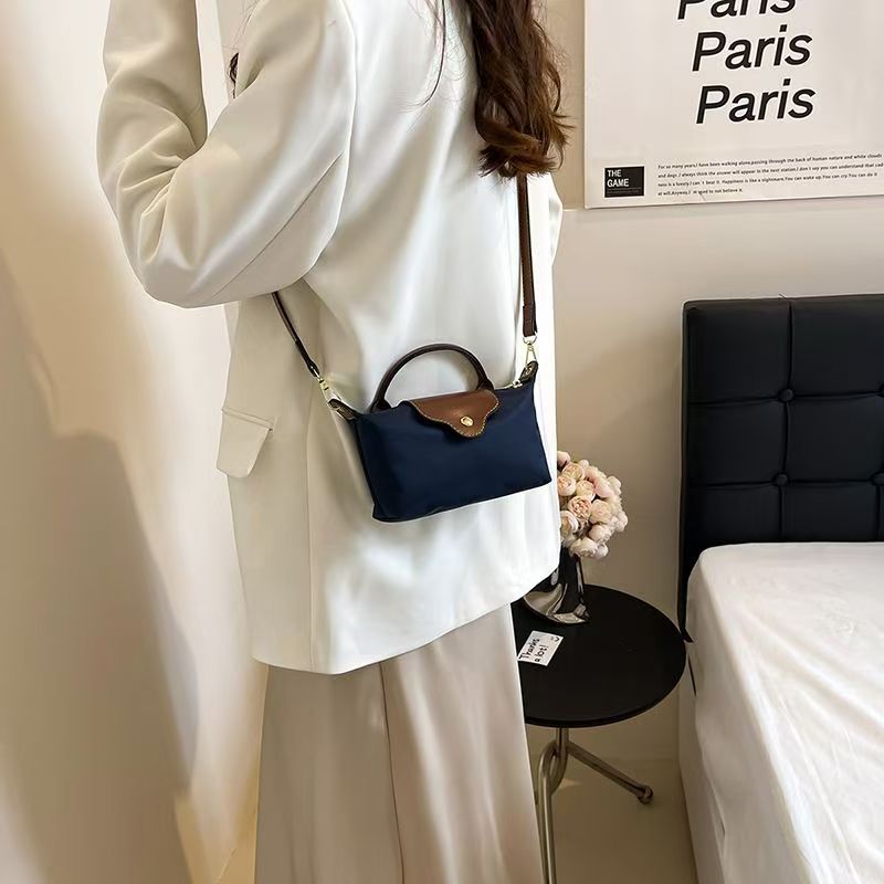 Free shipping mini bag charm single shoulder crossbody bag beach bag texture hand bag bag armpit new mahjong bag designer bag 2025