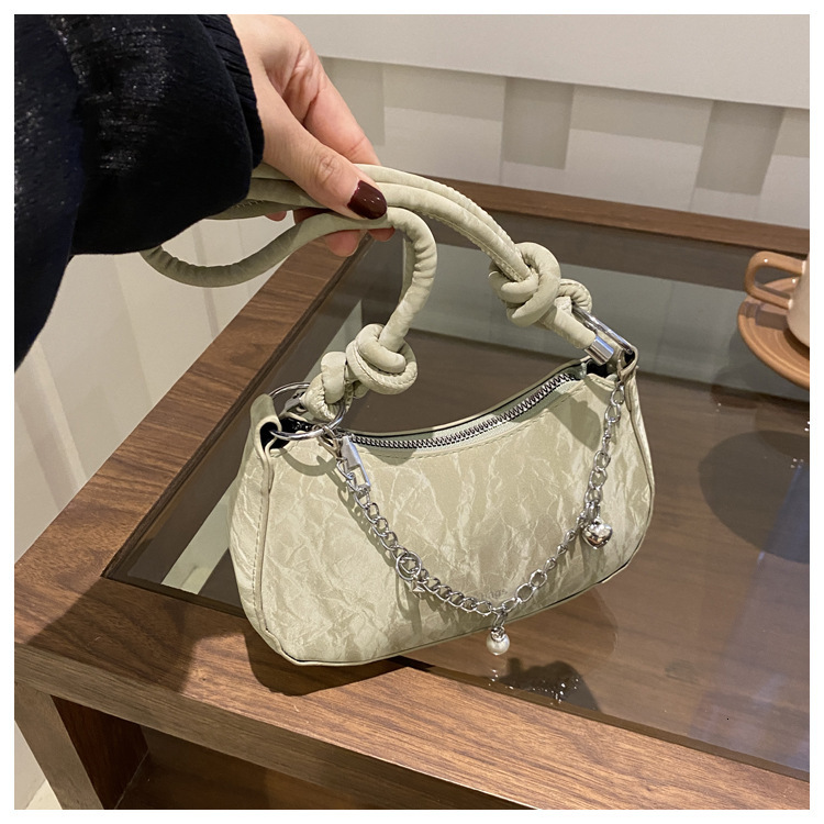 Exquisite and fashionable fashion women s solid color summer new casual simple one shoulder one piece fashion armpit bag designer shoulder bag