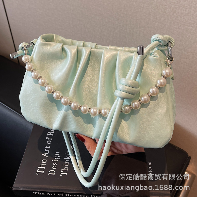 Small niche women s handbag spring and summer new fashion chain crossbody bag popular women s pleated fashion fashion cloud bag designer shoulder bag