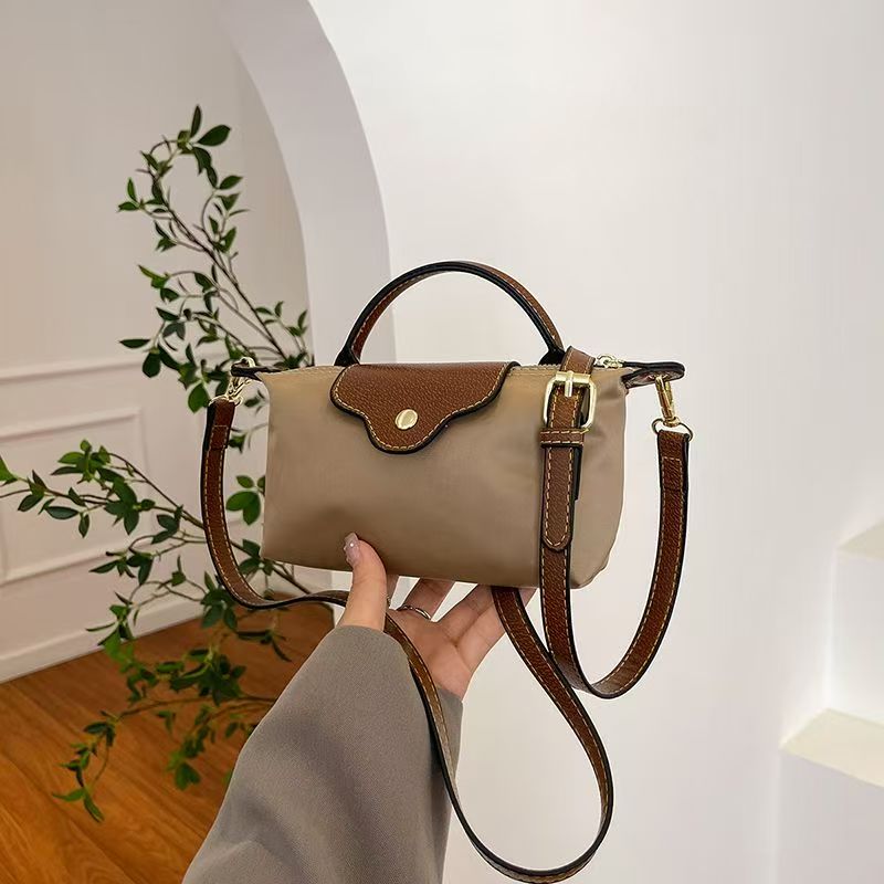 Free shipping mini bag charm single shoulder crossbody bag beach bag texture hand bag bag armpit new mahjong bag designer bag 2025