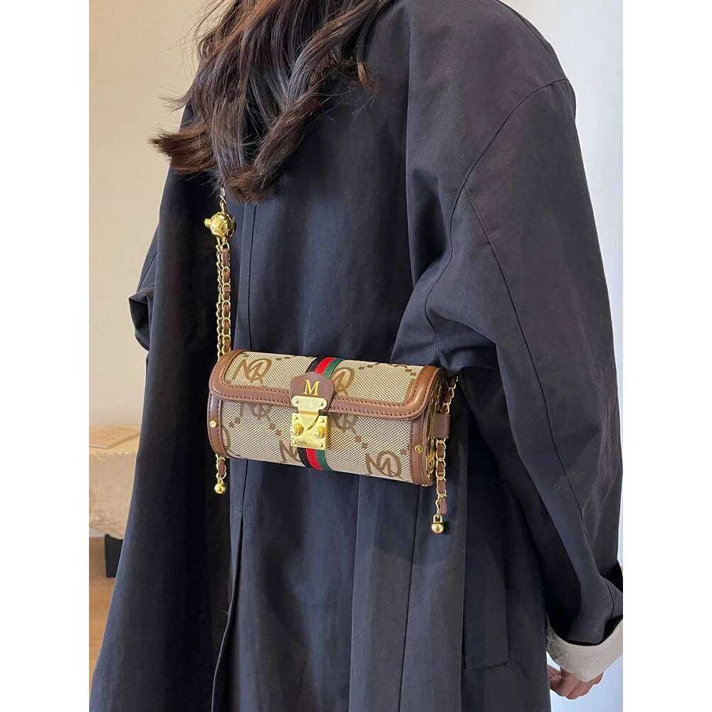 Light brand-name high-end designer female 2025 new spring and summer niche shoulder messenger cylinder bag