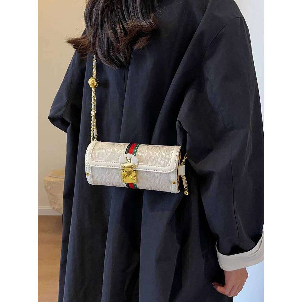 Light brand-name high-end designer female 2025 new spring and summer niche shoulder messenger cylinder bag