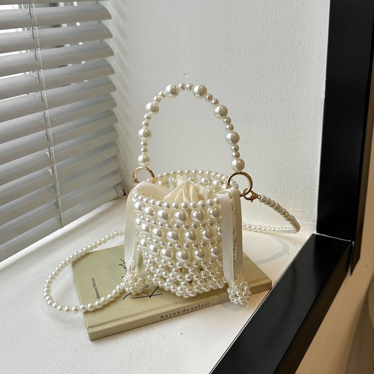 Cross border pearl handbag new woven bag retro bead water bucket bag fashion fashionable single shoulder fashion crossbody bag designer single shoulde