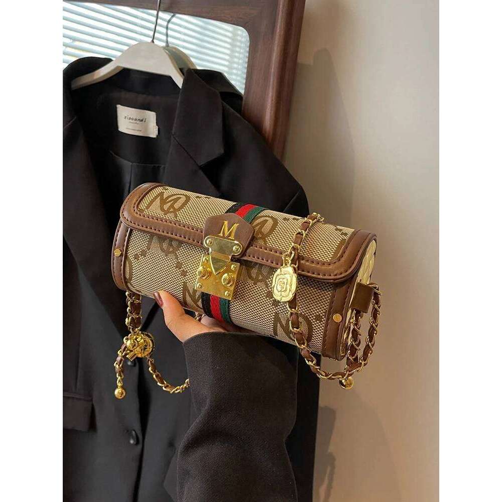 Light brand-name high-end designer female 2025 new spring and summer niche shoulder messenger cylinder bag