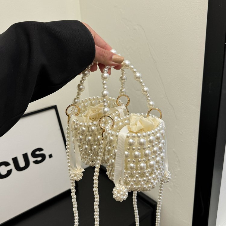 Cross border pearl handbag new woven bag retro bead water bucket bag fashion fashionable single shoulder fashion crossbody bag designer single shoulde