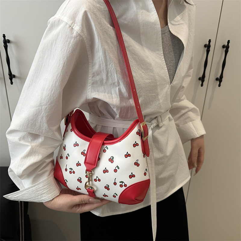 Retro niche new fashion print texture elegant and fashion versatile single shoulder women s fashion armpit bag designer women s single shoulder bag cr