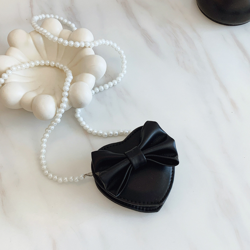 New heart shaped bow children s bag fashionable and sweet girl pearl accessories crossbody fashion bag designer women s fashion shoulder bag