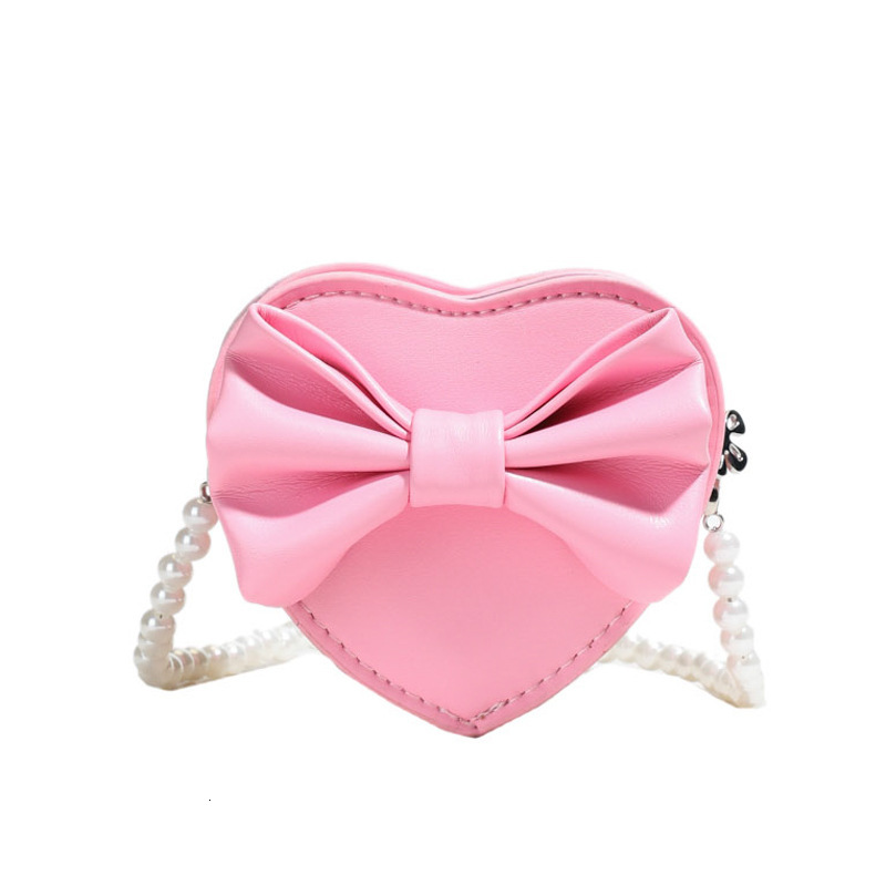 New heart shaped bow children s bag fashionable and sweet girl pearl accessories crossbody fashion bag designer women s fashion shoulder bag
