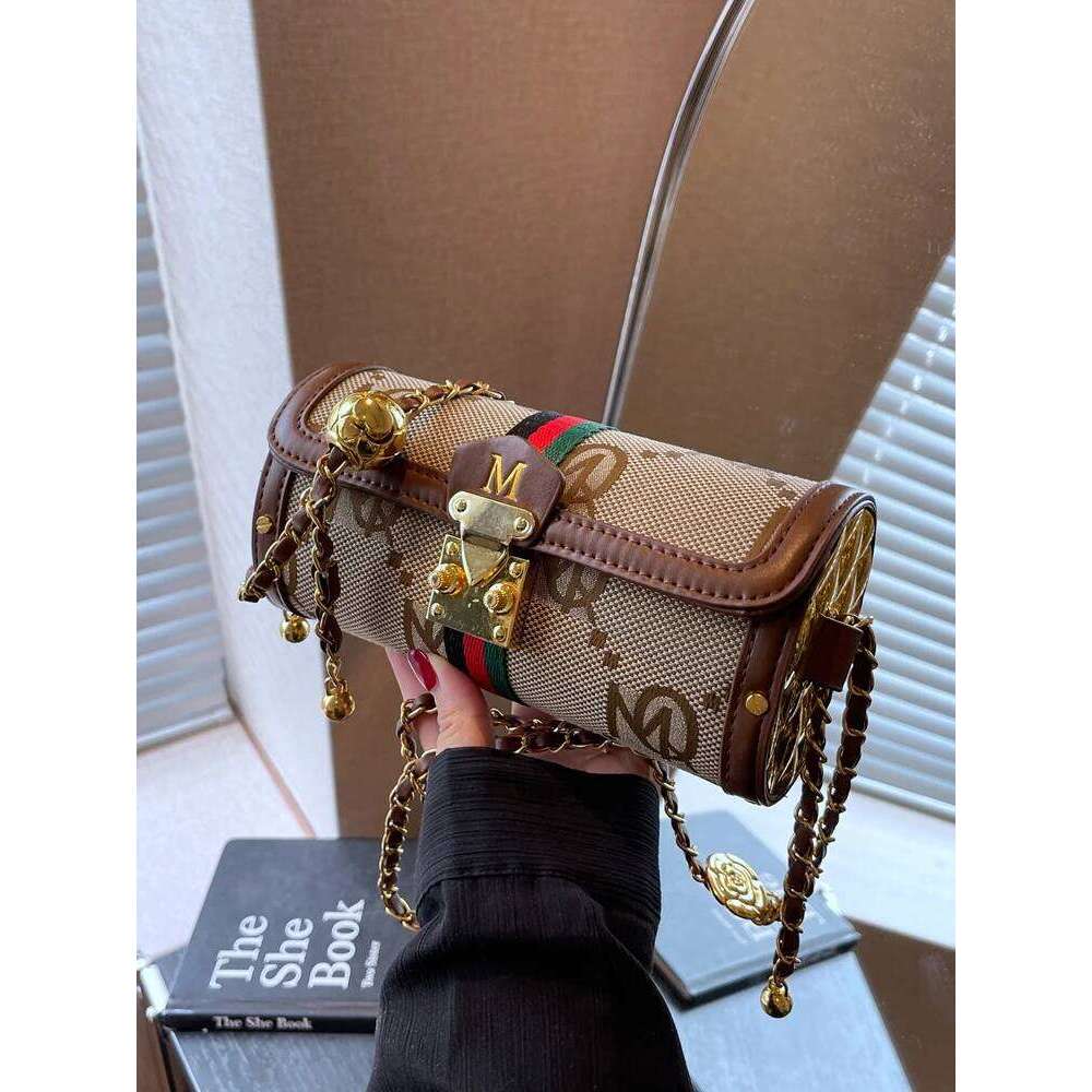 Light brand-name high-end designer female 2025 new spring and summer niche shoulder messenger cylinder bag