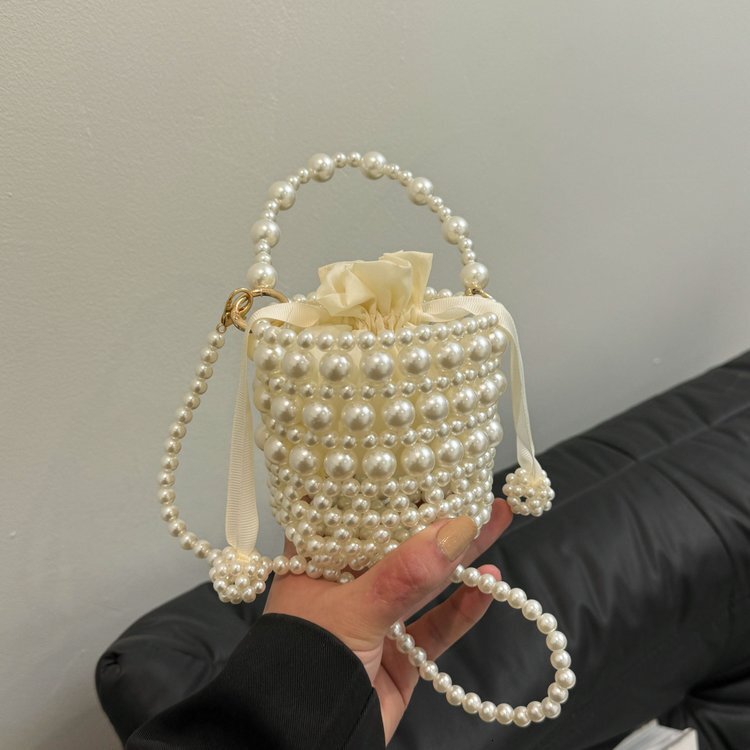 Cross border pearl handbag new woven bag retro bead water bucket bag fashion fashionable single shoulder fashion crossbody bag designer single shoulde