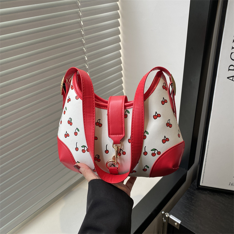 Retro niche new fashion print texture elegant and fashion versatile single shoulder women s fashion armpit bag designer women s single shoulder bag cr
