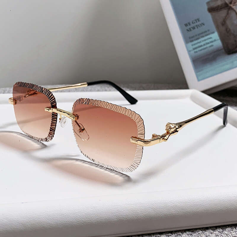 Cross-Border New Designer Sawtooth Frameless European and American Ins Fashion Leopard Head Metal Sunglasses