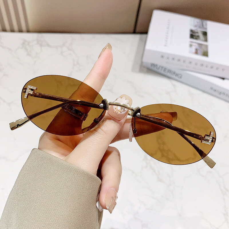 European and American Trend Small Decorative Glasses Rimless F Diamond Inlaid Oval Frame Fashion High-end Sunglasses Wholesale