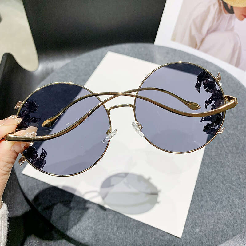 New anti blue light frameless cut edge inlaid diamond sunglasses, fashionable round rhinestone sunglasses with wave design, leg sunglasses, sunshade g