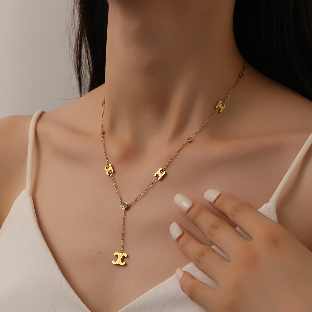 Fashion free shipping Titanium 5 Pendant luxury Tassel Clip Diamond Cross-Border Exquisite Stainless Steel designer Non-Fading Arc De Triomphe Necklac