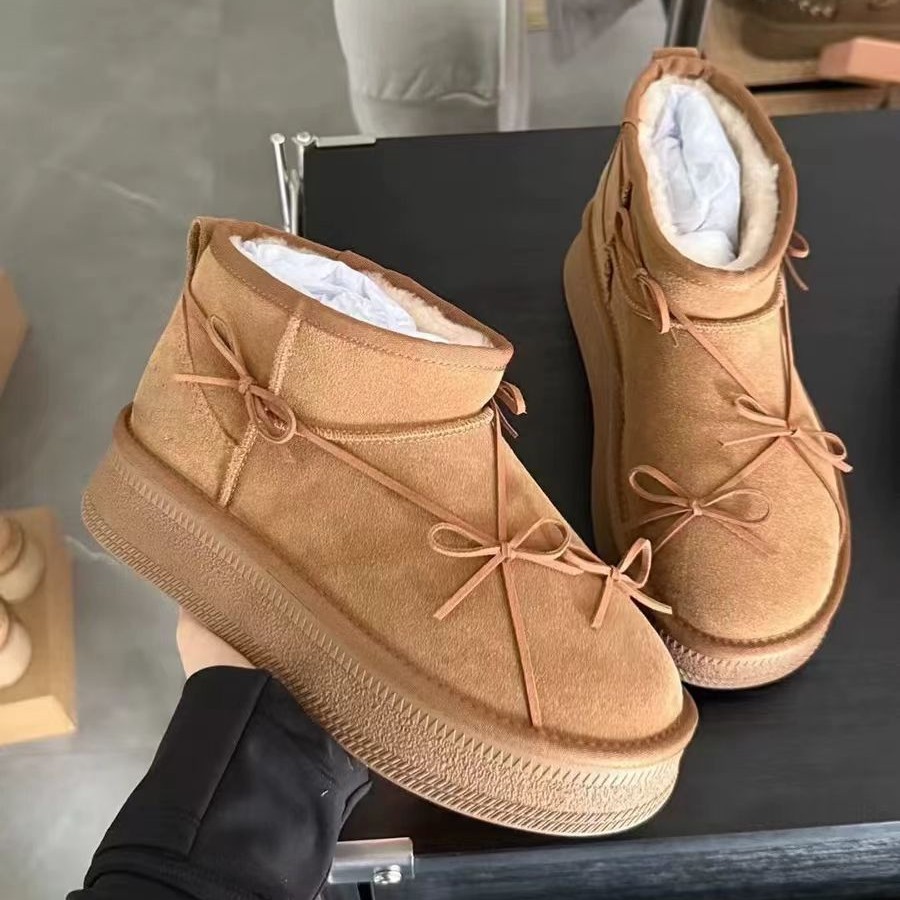 Winter designer's new thick soled butterfly knot snow boots for women with plush insulation and anti slip short boots free shipping size 35-40