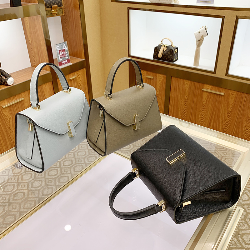 New Women's Handbag free shipping Elegantly Simple Solid Color Tote Bag with Palm Print, Kelly Bag, Versatile Commuter Shoulder or Crossbody Bag