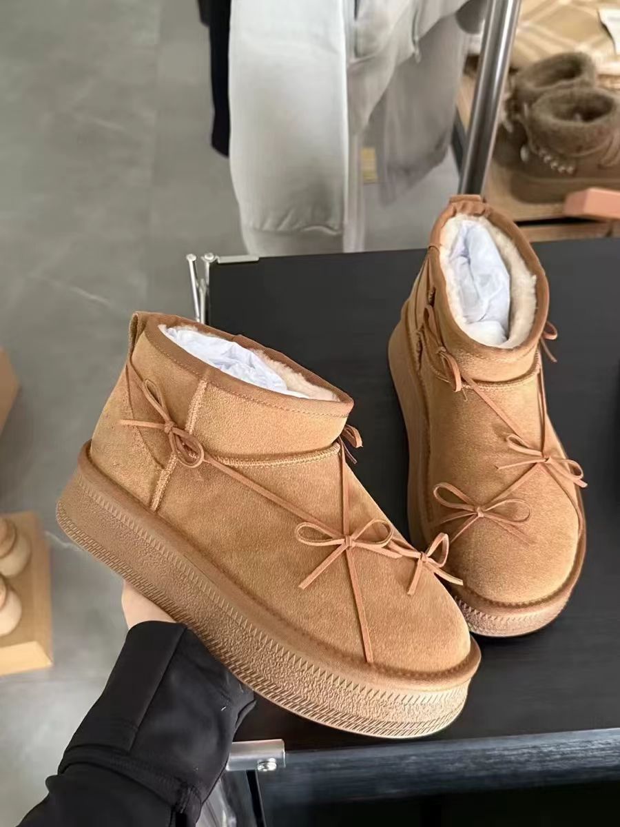 Winter designer's new thick soled butterfly knot snow boots for women with plush insulation and anti slip short boots free shipping size 35-40