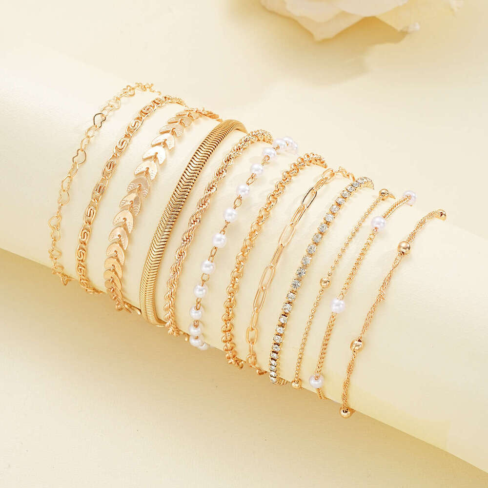 European and American 12-Piece Fashion Metal Minimalist Bracelet Set Leaf Imitation Pearl Beaded Jewelry designer luxury jewelry gold alloy bracelets