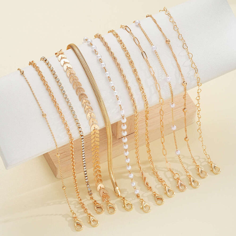 European and American 12-Piece Fashion Metal Minimalist Bracelet Set Leaf Imitation Pearl Beaded Jewelry designer luxury jewelry gold alloy bracelets