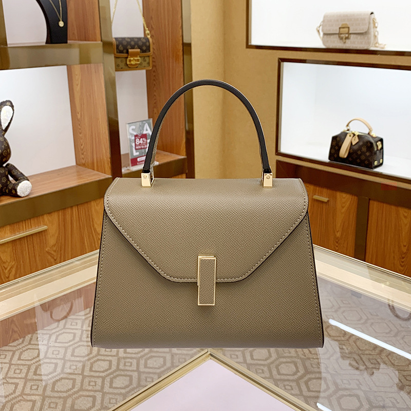 New Women's Handbag free shipping Elegantly Simple Solid Color Tote Bag with Palm Print, Kelly Bag, Versatile Commuter Shoulder or Crossbody Bag