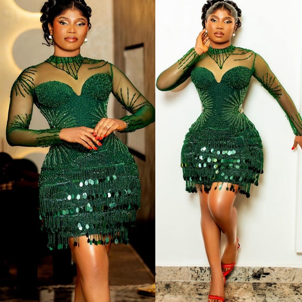 2026 Dark Green Sheath Cocktail Dress Tassels Sheer Neck Beaded Full Sleeves Short Mini Graduation Homecoming Dresses For Special Occasions Sweetheart